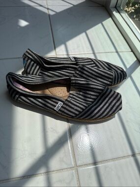 Toms Black and Gray Striped Slip-On Canvas Shoes
